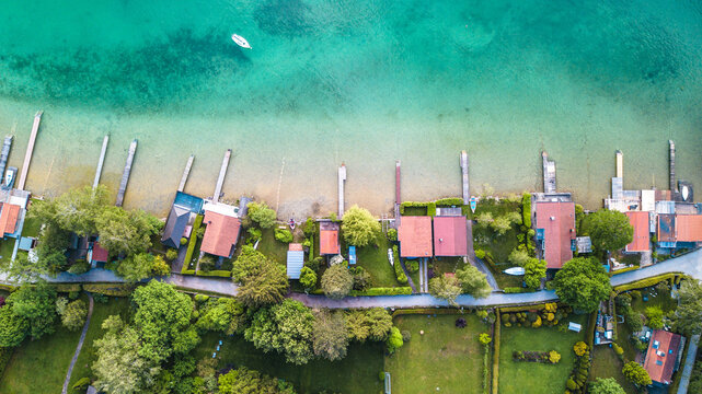 Aerial view over W&ouml;rthsee, beautiful lake with small docks in Bayern, Germany.
