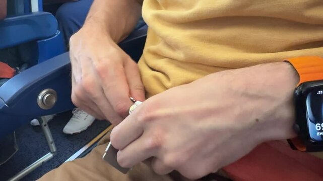 unsuccessful attempts to unbuckle the seat belt in the passenger seat of the aircraft, aviation safety