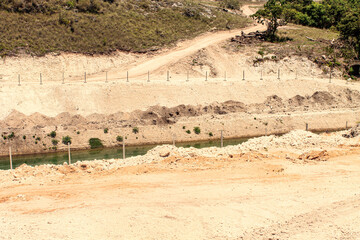 In the rock-strewn savanna under scorching, grass-parching heat, a hidden water source flows...