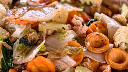 Cap cay, a delicious stir-fried vegetable dish, served fresh and close-up, showcases a vibrant mix of textures and colors. Indonesian cuisine