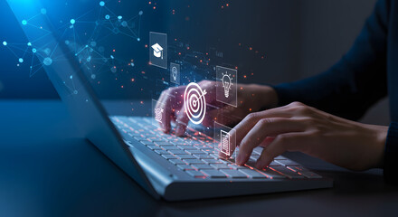 Hands are typing on a laptop keyboard, using online banking technology to communicate securely via email on the computer screen for business