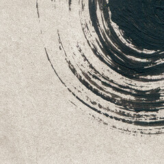 circle dynamic brush stroke on painted flat fade pastel beige brown sepia cement texture concrete plaster stucco wall corner upper right background
