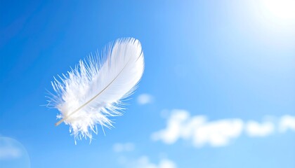 Naklejka premium White feather floating in a vibrant blue sky