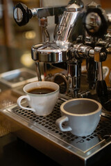 Two cups of coffee on espresso machine