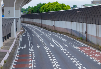 A cityscape of the empty street at the urban city street under the overpass