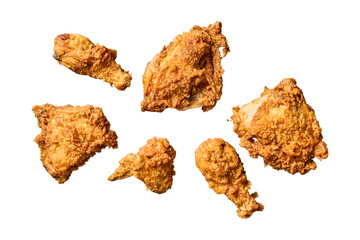 Crispy golden fried chicken tenders arranged on a gray surface isolated on transparent background