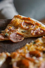 Close up of a slice pepperoni pizza