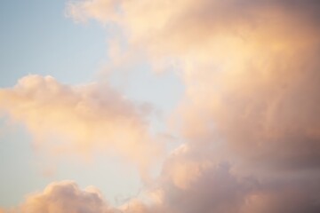 Golden Hour Clouds Painting the Evening Sky with Soft Hues