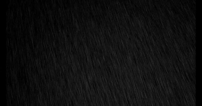 Realistic Rain Falling footage animation in real time on dark black background, Seamless Rain Drops, Heavy Rain, seamlessly looped rain animation Cinematic Rain Effect for Film and Video digital compo