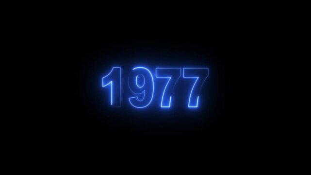 Glowing neon numeric text 1977 year countdown icon background 4k animation. cyan neon font alpha year. Neon year 1977 with alpha channel, Energy&nbsp;neon&nbsp;1977&nbsp;year.