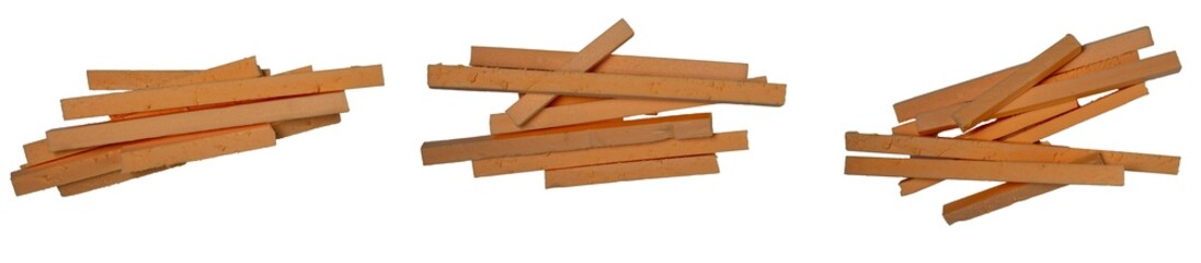 Isolated collecttion of broken pieces of red foam on white background