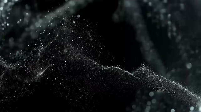 Black powder material rotates slowly in a dimly lit environment highlighting fine particles, Generic Black Powder Material Rotating Slowly