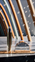 Golden bottle and glass dome with floating spheres image