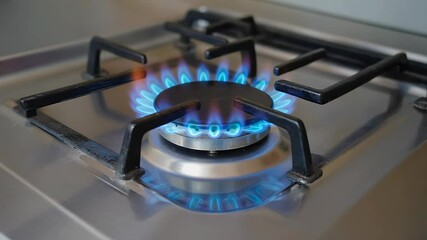 Cooking with gas on a modern stovetop while preparing a delicious meal