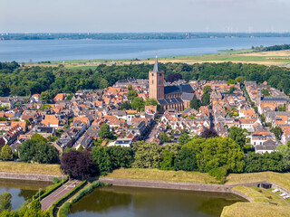 Naklejka premium Aerial view of Naarden and Grote Kerk church in fortified town Netherlands