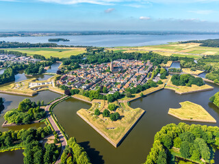 Aerial view of Naarden star fortress surrounded by moat in Netherlands