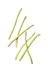 Fresh green asparagus stalks scattered on a surface isolated on transparent background