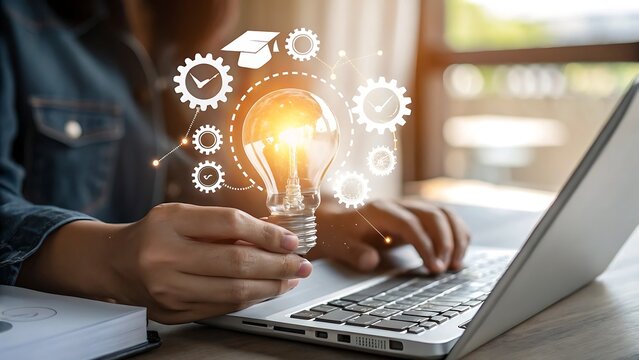 Person holding a glowing light bulb with gears and graduation cap icons symbolizing innovation and education
