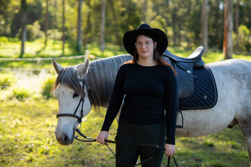 Portrait of a woman horse rider in Australia
