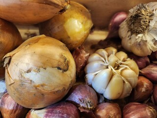 Photo Of Onions And Garlics In A Pile
