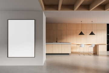 Minimalist wooden kitchen interior with modern island, bar stools, pendant lights and blank...