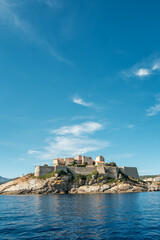 The medieval citadel of Calvi on the west coast of the Mediterranean island of Corsica with blue sky above