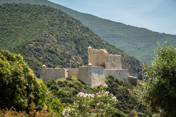 The recently renovated Genoese tower and fortress at Girolata, a small fishing village on the west coast of the mediteranean island of Corsica, only reached by foot or by boat