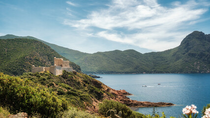 The recently renovated Genoese tower and fortress at Girolata, a small fishing village on the west coast of the mediteranean island of Corsica, only reached by foot or by boat