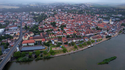 A panorama aerial view around the downtown in the city Kitzingen Germany on a Cloudy spring morning	