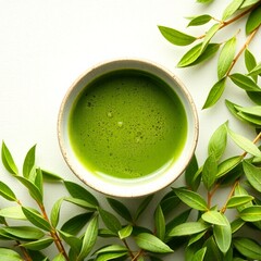 Fresh Matcha Tea in a Ceramic Cup with Green Tea Leaves