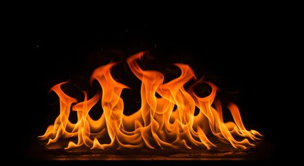 Fototapeta premium Fire Flames on Black Background