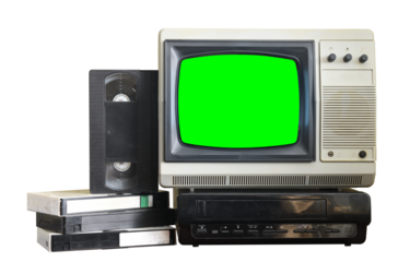 Old black vintage television with green screen and VCR from 1980s, 1990s, 2000s isolated on green background.