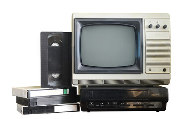 Old vintage TV with VCR and video cassettes isolated on white background.