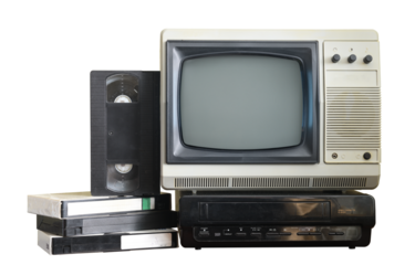 Old vintage TV with VCR and video cassettes isolated on white background.
