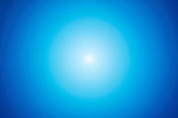 Bright Circular Glow in the Center of a Vibrant Blue Gradient Background