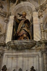 Obraz premium Seville, Spain 03.24.2019: Gothic sculpture in side chapel of the Seville Cathedral