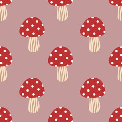 Cute red mushrooms with white dots on soft pink background. Whimsical pattern ideal for kids, fabric, nursery decor, and woodland-themed designs.