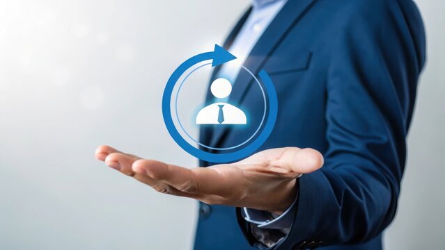 Person in blue suit holding digital human icon with circular arrow hand