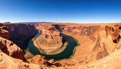 Stunning panoramic view of Horseshoe Bend in Arizona, showcasing majestic cliffs and a winding river under a clear blue sky.