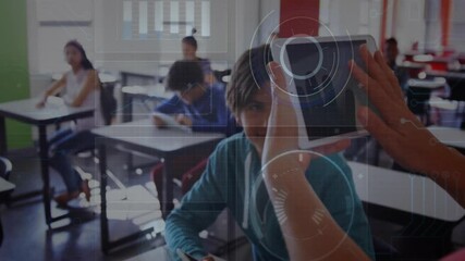 Classroom teacher scanning student with tablet data overlay for assessment pausing writing - Powered by Adobe