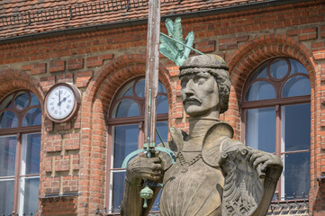 Stendal Roland statue stands in front of historic town hall in market square from 1525