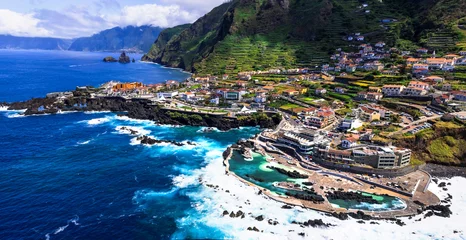 Fotobehang Madeira island Portugal. Aerial view of Porto Moniz with natural swim pools. Popular tourist attraction and scenic destinations © Freesurf