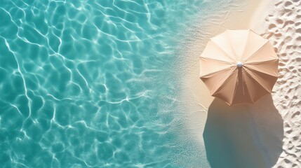  Summer background with a beach parasol near the sea waves. top view, free copy space