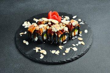 Sushi set with eel, avocado and cream cheese. Asian cuisine. Top view. Free space for your text.