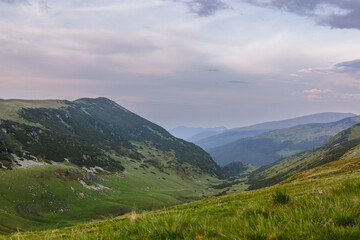 The Carpathian Mountains in Romania are a majestic mountain range, rich in wildlife, forests, and breathtaking landscapes.