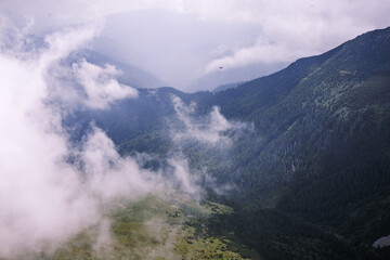 A beautiful landscape of mountains lost in the clouds