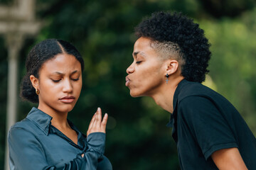 young man rejecting the kiss or doing the cobra