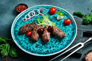 Lyula kebab made of veal. Barbecue menu. Azerbaijani cuisine. Top view.