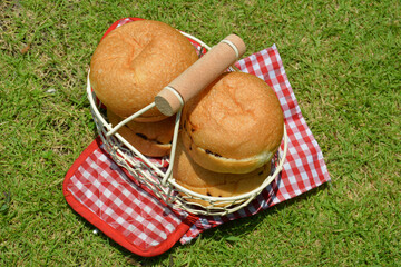 Photo Of Cream Filled Bread In A Basket On A Picnic