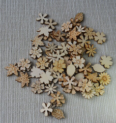 Photo Of A Pile Of Woods Carved Into Flowers